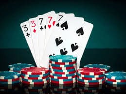 Filipino player watching live casino dealer stream on smartphone in Philippines